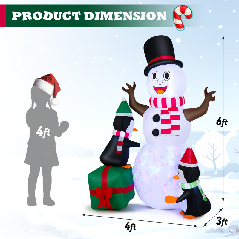 Bonhomme de neige gonflable de Noël et pingouins