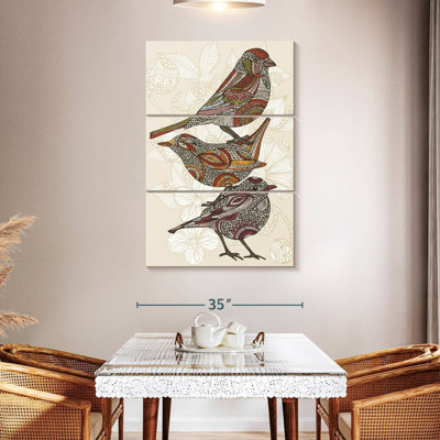 Trois petits oiseaux en ronce