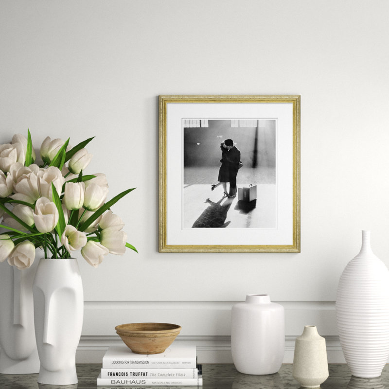 Couple Kissing in Train Station Framed