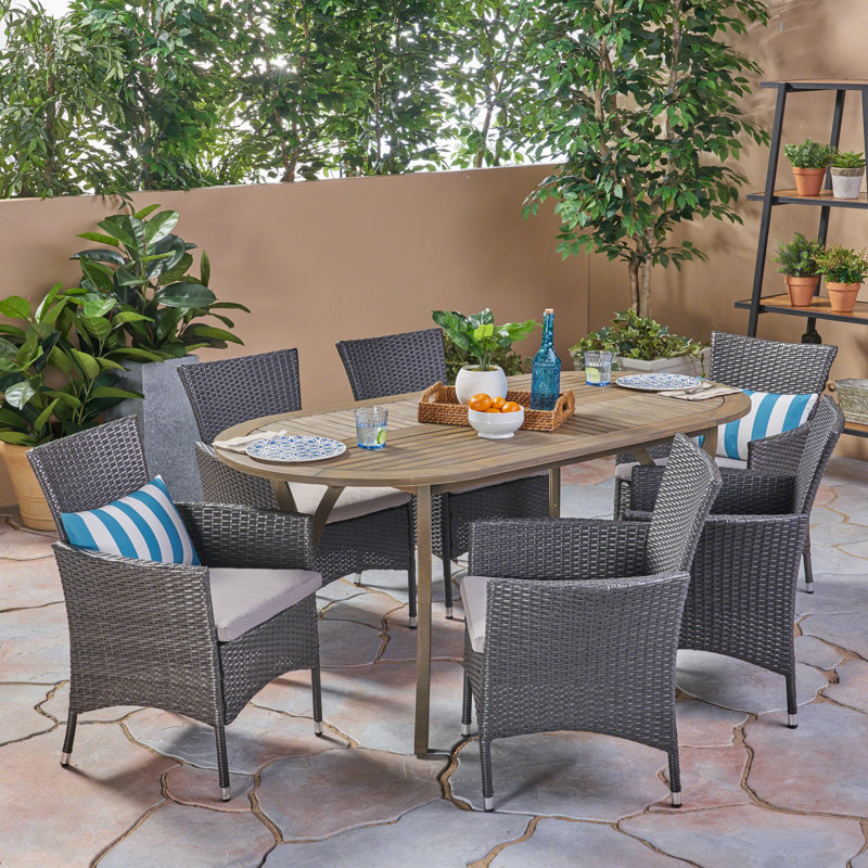 Kendra 6 - Person Acacia Solid Wood Patio Dining Set Oval Table, Gray