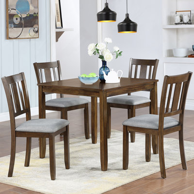Five-Piece Modern Dining Set Comprising A Square Wooden Dining Table And Four Upholstered Chairs For A Stylish Dining Experience