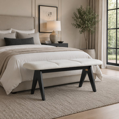Banc rembourré moderne noir et blanc avec une construction robuste et des sièges confortables, parfait pour les vestibules et les espaces de vie