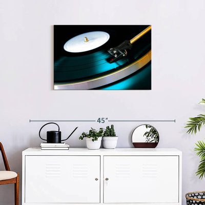 Abarca Playing Vinyl Record