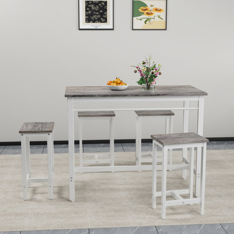 Ensemble table et tabourets de bar 5 pièces, structure en métal, chêne blanc, idéal pour un café avec une finition blanche, convient pour un petit-déjeuner ou un espace de travail.