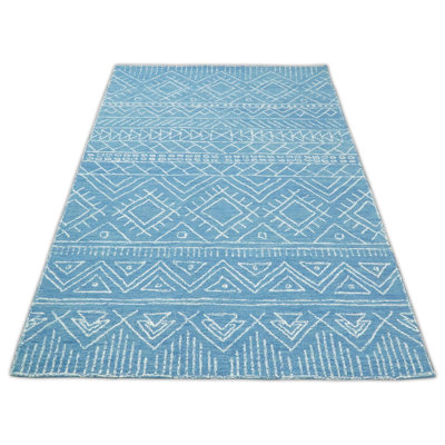 Tapis bleu / blanc en laine touffeté à la main à motif géométrique