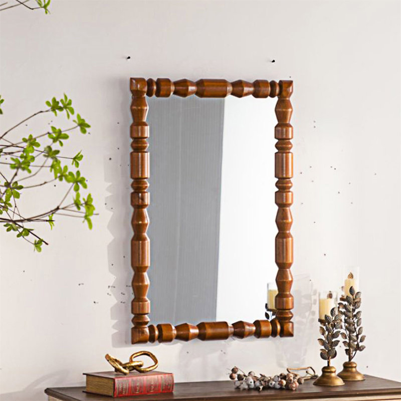 Miroir mural en bois sculpté