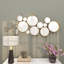 Miroir mural rond en métal doré