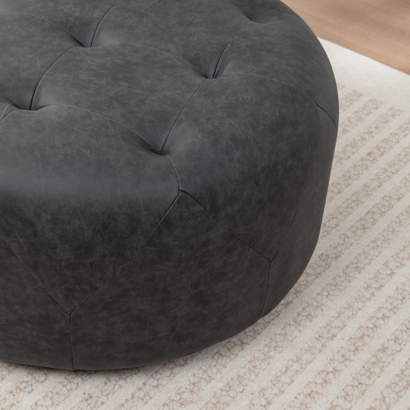 Castanedo Upholstered Round Ottoman, Polyester - Vintage Black