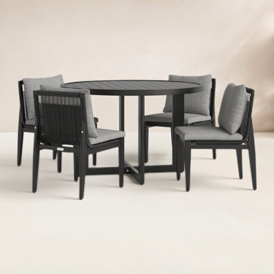 Trosclair Round 4 - Person 48'' Long Dining Set with Cushions