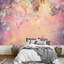 Grand papier peint vinyle Onirique rose avec pétales volant dans le vent-93997250