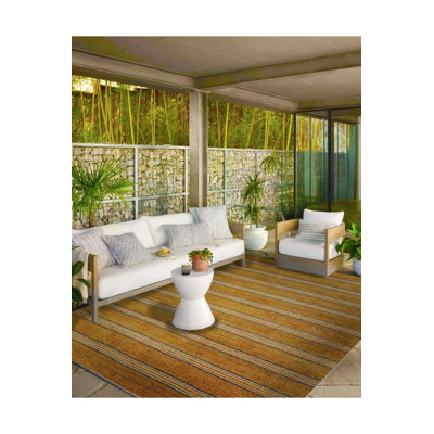 Tapis décoratif brun à rayures épaisses