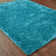 Albritton Hand Tufted Teal Area Rug