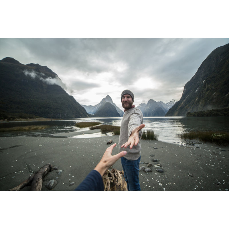 Man Offering Helping Hand To Partner by Swissmediavision - No Frame Art Prints on Canvas, 20cm H x 30cm W