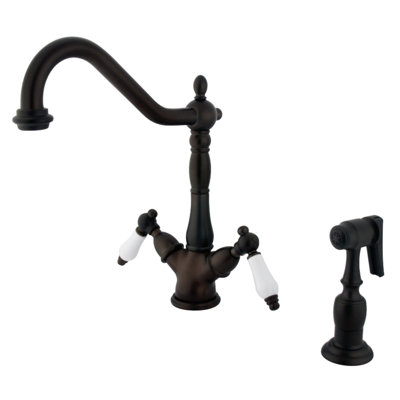 Kingston Brass Heritage Two-Handle 2-or-4 Hole Deck Mount Kitchen Faucet with Brass Sprayer
