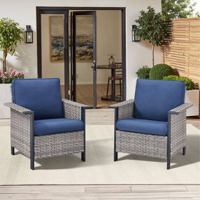 Ensemble de 2 chaises longues d'extérieur en osier gris avec coussins bleus pour véranda ou terrasse