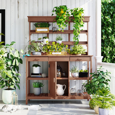 Table de rempotage pour l'extérieur en bois massif 50,2 x 19,7 x 66 pouces, poste de travail de jardin avec 2 tiroirs, armoire et tablettes ouvertes - brun