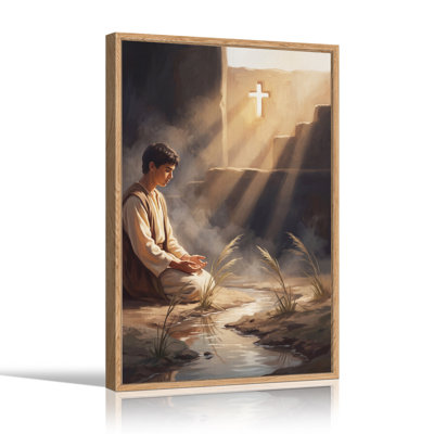Praying Man Beside Stream With Glowing Cross Canvas Wall Art