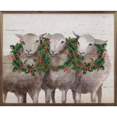 Mouton avec des couronnes des Fêtes