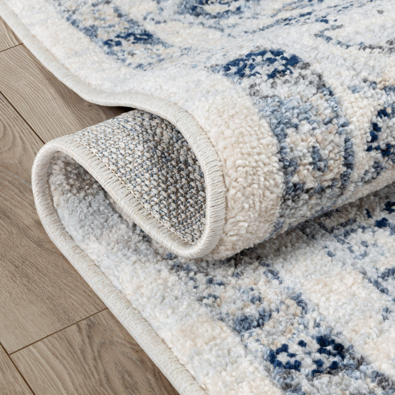 Ivory and Blue Medallion Synthetic 5' x 7' Area Rug