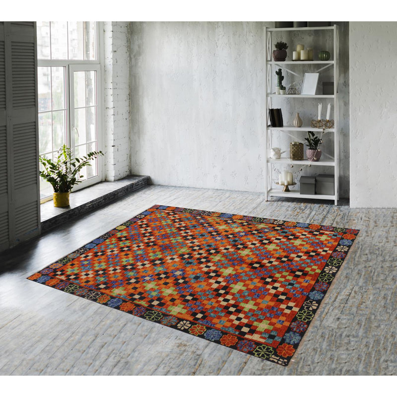 Tapis orange / rouge / noir en laine noué à la main à motif géométrique 4 pi 9 po x 6 pi 7 po Laudalino