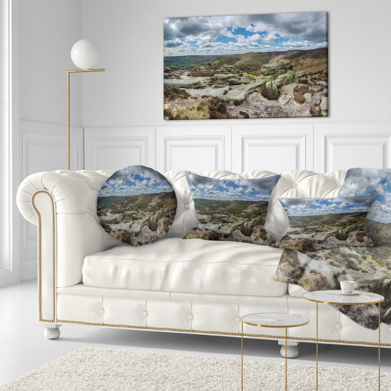 Coussin lombaire avec nuages et pierres