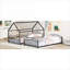 Lit superposé simple au-dessus d'un lit simple en métal noir profond, de style maisonnette avec glissoire pour chambre d'enfant
