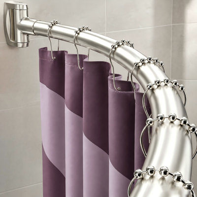This brushed nickel adjustable rounded curved shower rod spans 33-78 in; rustproof stainless steel construction and a non-slip bowed design provide extra shower space for bathrooms, bathtubs, and stalls, and drilling is required.