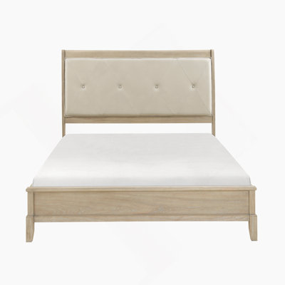 Grand lit classique de style campagnard avec tête de lit tapissier beige et cadre en bois, parfait pour les chambres rustiques et modernes.