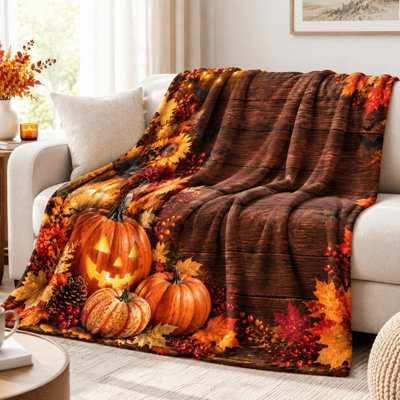 Couverture douillette citrouille pour l'Halloween, couverture en peluche festive sur le thème des récoltes d'automne, idéale pour canapé, lit, salon et décoration intérieure.