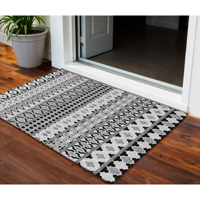 Tapis intérieur / extérieur lavable quadrilobe 3 pi x 5 pi noir et ivoire