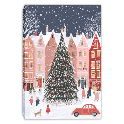 Arbre de Noël dans un village enneigé, art mural sur toile carrée