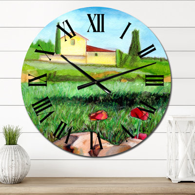 Maison de campagne avec deux fleurs rouges dans les champs verts - horloge murale
