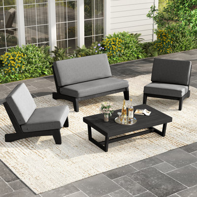 Polett 4 - Person Teak Solid Wood Outdoor Seating Group with Cushions
