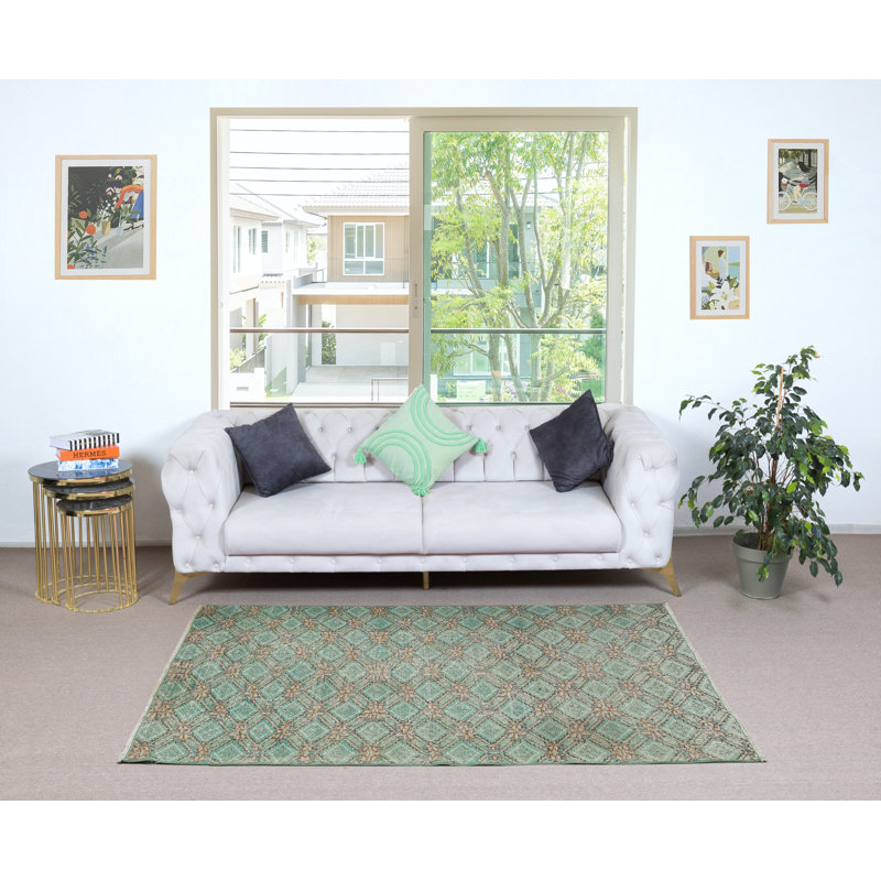 Tapis turc vintage à motif floral noué à la main dans des tons de vert