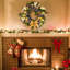 Couronne de Noël de 24 pouces pour la porte d'entrée, couronne de Noël pré-éclairée avec des arcs, des feuilles d'or et des boules décoratives