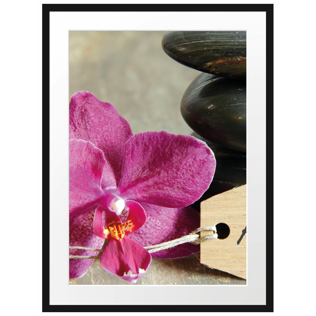 Gerahmtes Poster Auszeit Orchidee mit Zen Steinen