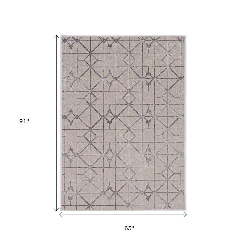 Tapis géométrique ivoire et argenté 5 pi x 8 pi