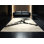 Tapis beige doux et moelleux à motif géométrique moderne et audacieux