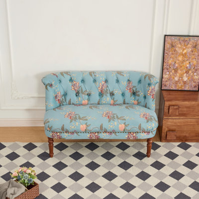 Chaise de canapé à imprimé floral avec capitonnage classique et pieds en bois robustes pour une utilisation polyvalente dans le salon ou la chambre à coucher