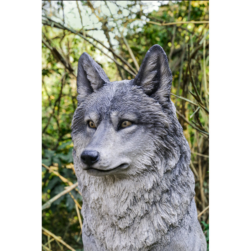 Statue de loup assis