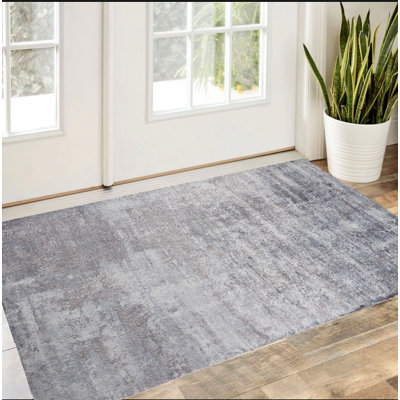 Tapis abstrait gris clair tissé à la main