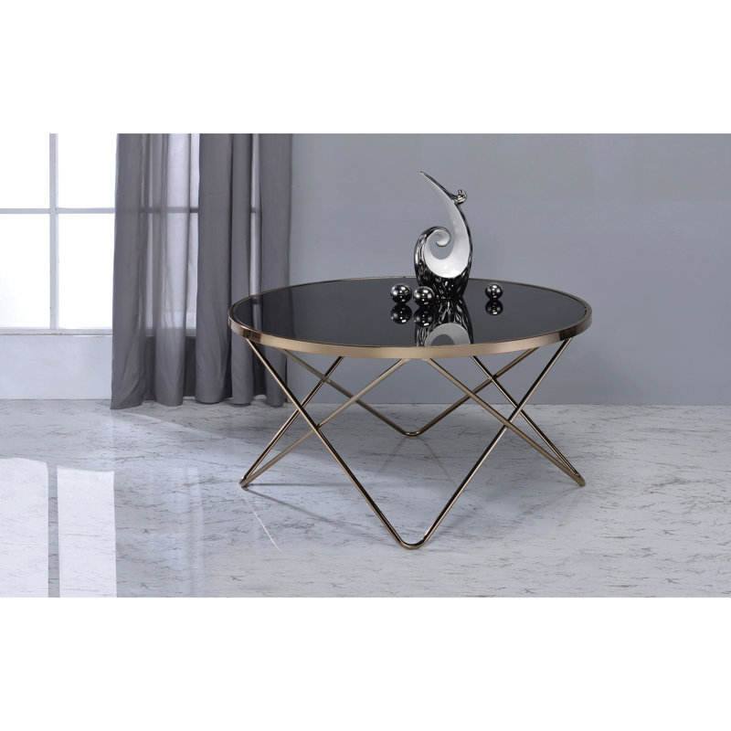 Table de salon chic avec verre noir et champagne