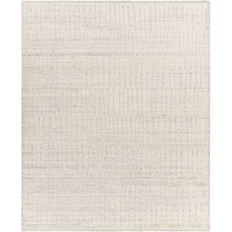 Saahith Solid Colour Handmade Wool Area Rug in Grey