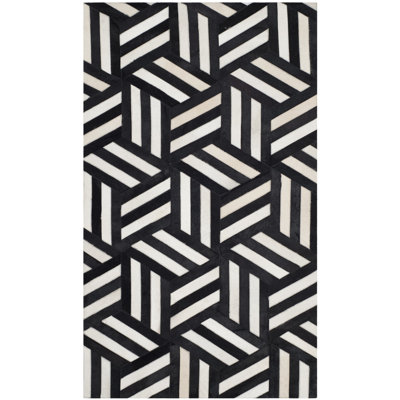 Tapis géométrique en cuir tissé à la main Stasia