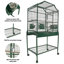 Grande cage à oiseaux verte victorienne au dernier étage-112745264-132420540