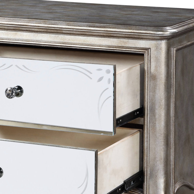 Charmante table de chevet champagne antique avec options de tiroirs spacieuses et façade en miroir