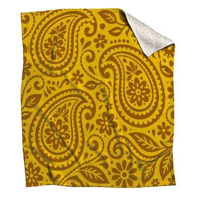 Couvertures brun et jaune à motif cachemire