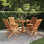 Jamarquez 4 - Person Teak Solid Wood Patio Dining Set Round Table