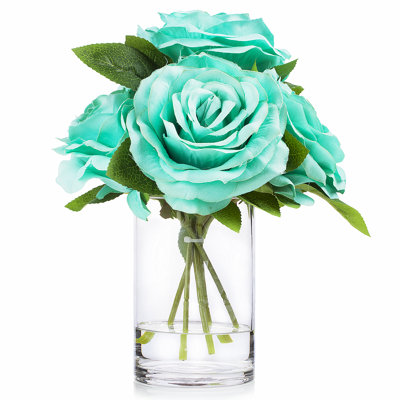 Arrangement floral à grandes têtes dans un vase