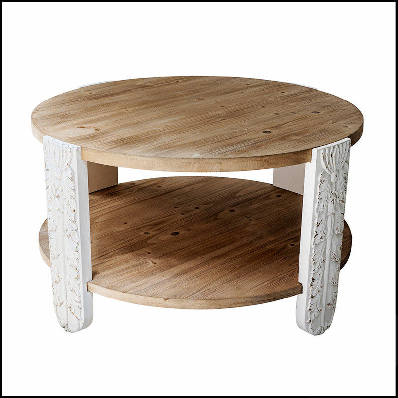 Table basse ronde en bois avec pattes sculptées et tablette de rangement inférieure, idéale pour un décor moderne ou traditionnel.